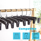 Lade das Bild in den Galerie-Viewer, Intirilife Hosenbügel Schwarz - 10 Stück Antirutsch Hosenbügel aus Kunststoff und Metall für Röcke Hosen - 31 x 3 x 15,5 cm - verstellbare Klammer, Kleiderbügel Klemmbügel Rockbügel Hosen Spanner