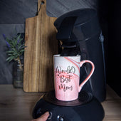 Lade das Bild in den Galerie-Viewer, Intirilife Kaffeetasse mit Deckel Muttertags Geschenk - World's Best Mom - in Rosa - 8 x 13 cm - Füllmenge 280 ml - Teetasse mit Marmor Optik für Geburtstag mit Geschenkebox