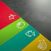 Lade das Bild in den Galerie-Viewer, Intirilife 4x Schneidebretter flexible Schneidematte in bunten Farben - 37.8 x 30.2 cm - Größe mit Lebensmittelsymbol - Rutschfeste BPA-freie Küchenunterlage für jede Situation